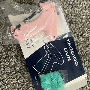 Pink Tagging Gun with Aqua Fasteners